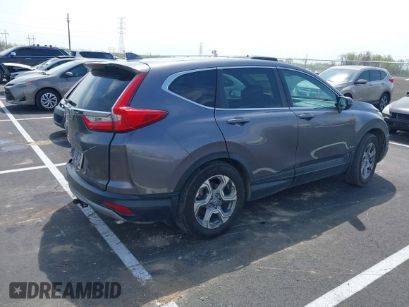 2017 Honda CR-V EX-L with VIN 7FARW1H89HE002384, listed as a IAAI auction lot 41908640 with 131,229 mi miles. Bid and sale history available at carsss.com. Image 4.