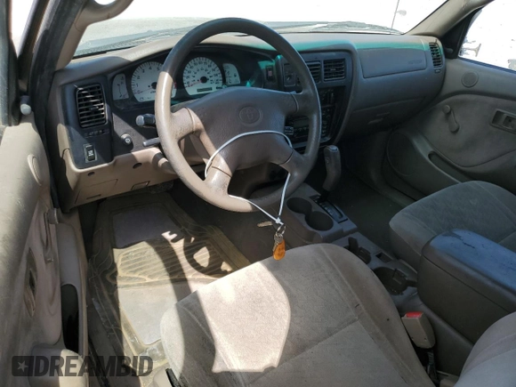 2002 Toyota Tacoma PreRunner с VIN 5TESN92N82Z071943, выставлен на аукционе Copart как лот 64393605 с пробегом 176 677 миль миль и Списание • Salvage title. История ставок и продаж доступна на DreamBid. Изображение 8.