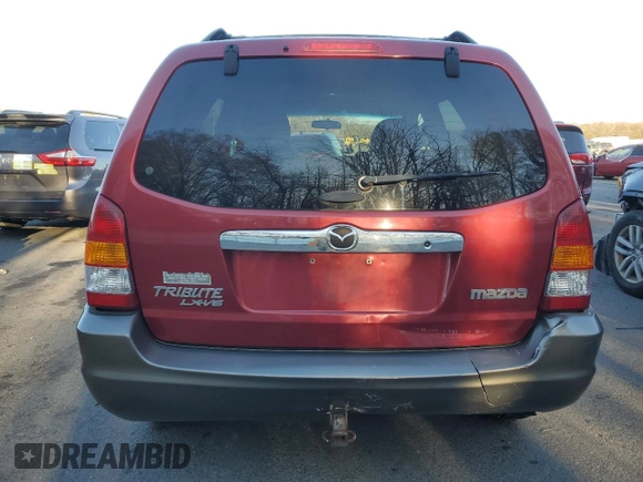 2001 Mazda Tribute LX with VIN 4F2CU08111KM19933, listed as a Copart auction lot 81174614 with 209,736 mi miles and Salvage Title. Bid and sale history available at DreamBid. Image 6.