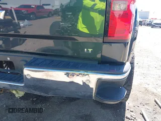 2018 Chevrolet Silverado 1500 LT with VIN 3GCPCREC1JG127396, listed as a IAAI auction lot 41790850 with 138,725 mi miles and . Bid and sale history available at DreamBid. Image 6.