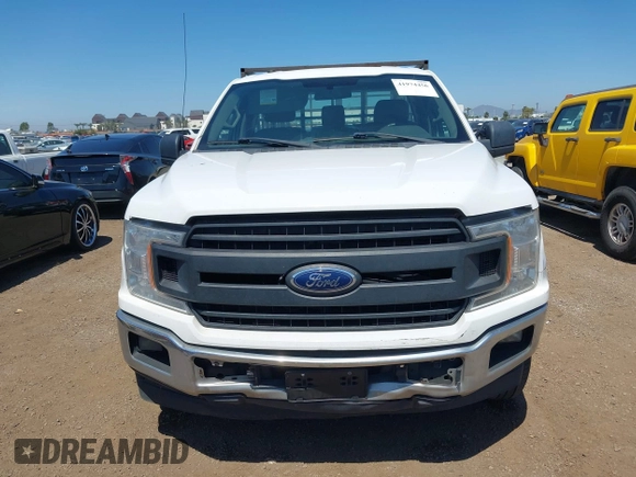 2018 Ford F-150 XL with VIN 1FTNF1CG9JKC41855, listed as a IAAI auction lot 41974456 with 330,339 mi miles and . Bid and sale history available at DreamBid. Image 12.