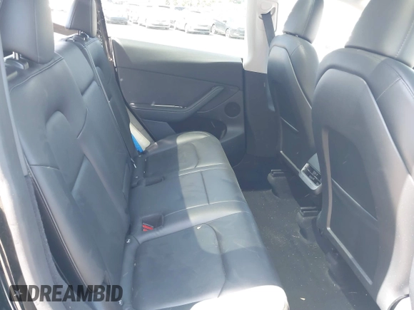 2023 Tesla Model Y Long Range with VIN 7SAYGDEE0PA111430, listed as a IAAI auction lot 42156924 with 35,950 mi miles and . Bid and sale history available at DreamBid. Image 8.