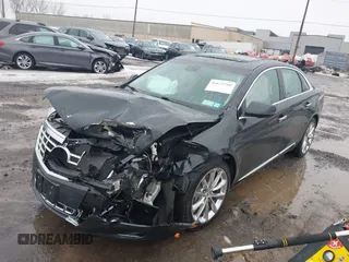 2013 Cadillac XTS Luxury z VIN 2G61R5S35D9100771, wystawiony jako IAAI lot #41673766 z przebiegiem 41 123 mil mil oraz . Historia ofert i sprzedaży dostępna na DreamBid. Obrazek 17.