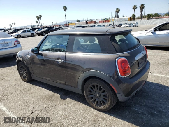 2014 MINI Hardtop with VIN WMWXM5C57ET934120, listed as a Copart auction lot 58594845 with 115,248 mi miles and Salvage title. Bid and sale history available at DreamBid. Image 2.