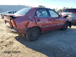 2001 Suzuki Esteem GL z VIN JS2GB41S915202412, wystawiony jako Copart lot #88372235 z przebiegiem 301 061 mil mil oraz Szkoda całkowita • Salvage title. Historia ofert i sprzedaży dostępna na DreamBid. Obrazek 3.