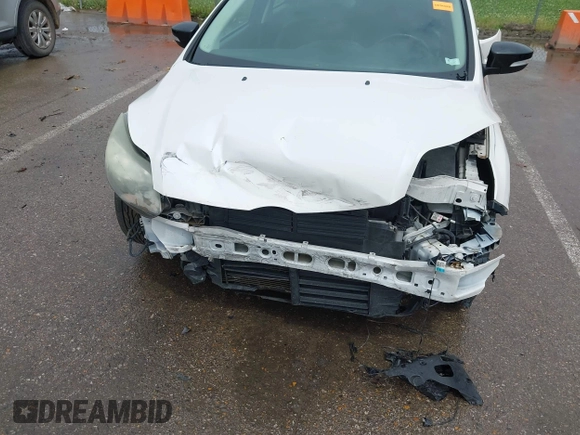2014 Ford Focus Titanium with VIN 1FADP3N24EL184220, listed as a IAAI auction lot 42429610 with 172,575 mi miles and . Bid and sale history available at DreamBid. Image 6.