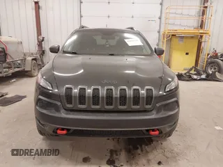 2015 Jeep Cherokee Trailhawk с VIN 1C4PJMBSXFW525218, выставлен на аукционе IAAI как лот 42032130 с пробегом 164 289 миль миль и . История ставок и продаж доступна на DreamBid. Изображение 12.