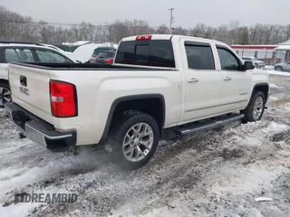 2015 GMC Sierra 1500 SLT with VIN 3GTU2VEC8FG160370, listed as a IAAI auction lot 41532702 with 112,129 mi miles and . Bid and sale history available at DreamBid. Image 4.