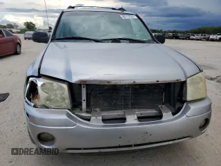 2005 GMC Envoy SLE with VIN 1GKES16S356104523, listed as a Copart auction lot 69112534 with 209,440 mi miles and Salvage Title. Bid and sale history available at DreamBid. Image 5.