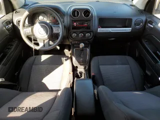 2014 Jeep Compass Sport with VIN 1C4NJDBB3ED757029, listed as a Copart auction lot 52460225 with 127,814 mi miles and Salvage Title. Bid and sale history available at carsss.com. Image 8.