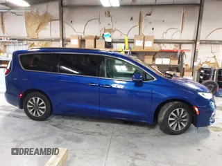 2021 Chrysler Pacifica Touring L z VIN 2C4RC1BGXMR503108, wystawiony jako IAAI lot #41914136 z przebiegiem 98 685 mil mil oraz . Historia ofert i sprzedaży dostępna na DreamBid. Obrazek 13.
