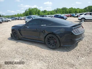 2016 Ford Mustang GT with VIN 1FA6P8CFXG5326279, listed as a Copart auction lot 59100565 with 52,972 mi miles and Salvage title. Bid and sale history available at DreamBid. Image 2.