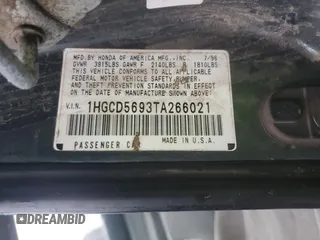1996 Honda Accord Value with VIN 1HGCD5693TA266021, listed as a Copart auction lot 86699844 with 237,152 mi miles and Salvage Title. Bid and sale history available at DreamBid. Image 12.