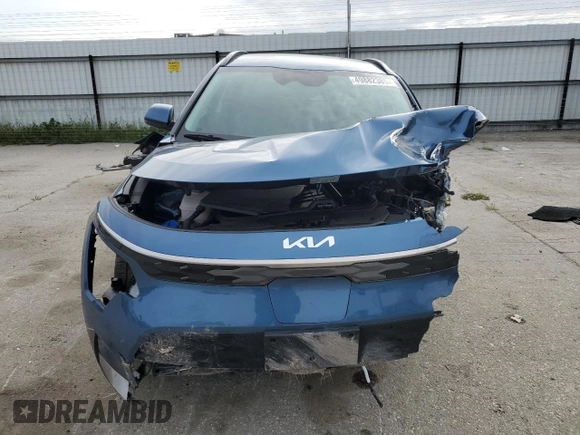 2024 Kia Niro Wind with VIN KNDCR3L19R5081041, listed as a Copart auction lot 49882385 with 7,803 mi miles and Salvage Title. Bid and sale history available at DreamBid. Image 5.