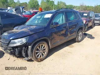 2015 Volkswagen Tiguan SE z VIN WVGBV7AX3FW583163, wystawiony jako IAAI lot #41991409 z przebiegiem 99 866 mil mil oraz . Historia ofert i sprzedaży dostępna na DreamBid. Obrazek 2.
