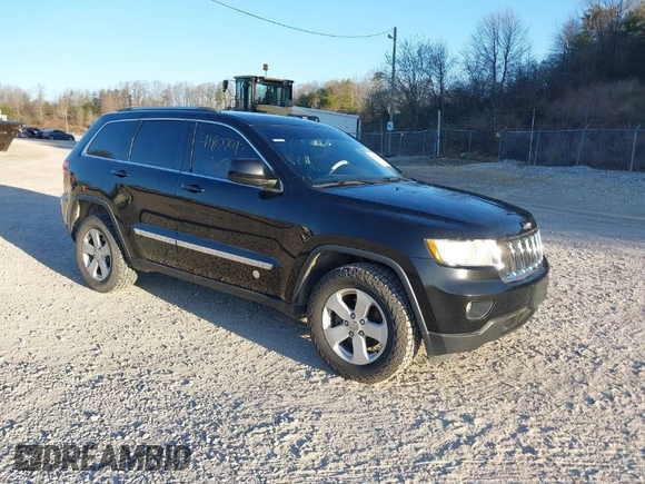 2012 Jeep Grand Cherokee Laredo with VIN 1C4RJFAG3CC246577, listed as a IAAI auction lot 41807693 with 164,574 mi miles. Bid and sale history available at carsss.com. Image 1.