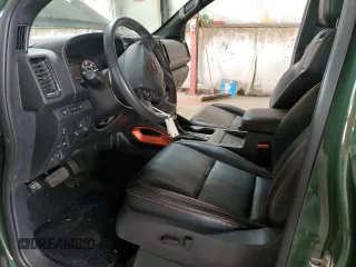 2023 Nissan Frontier Pro-4X z VIN 1N6ED1EK4PN671708, wystawiony jako Copart lot #58271305 z przebiegiem 22 906 mil mil oraz Szkoda całkowita • Salvage title. Historia ofert i sprzedaży dostępna na DreamBid. Obrazek 7.