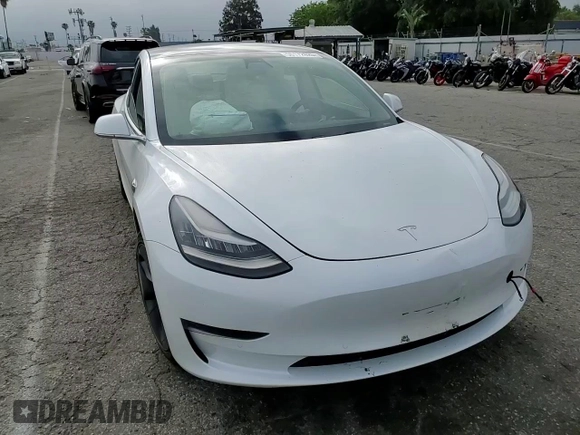 2019 Tesla Model 3 Mid Range z VIN 5YJ3E1EAXKF429382, wystawiony jako Copart lot #56172625 z przebiegiem Nie podano mil oraz Szkoda całkowita • Salvage title. Historia ofert i sprzedaży dostępna na DreamBid. Obrazek 13.