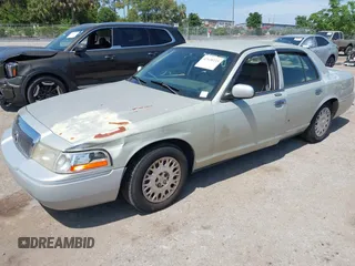 2004 Mercury Grand Marquis GS with VIN 2MEFM74W14X632470, listed as a IAAI auction lot 42120233 with 292,357 mi miles and . Bid and sale history available at DreamBid. Image 17.