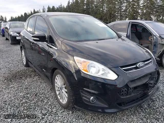 2016 Ford C-Max Energi SEL with VIN 1FADP5CU7GL106162, listed as a IAAI auction lot 41506915 with 126,046 mi miles. Bid and sale history available at carsss.com. Image 1.