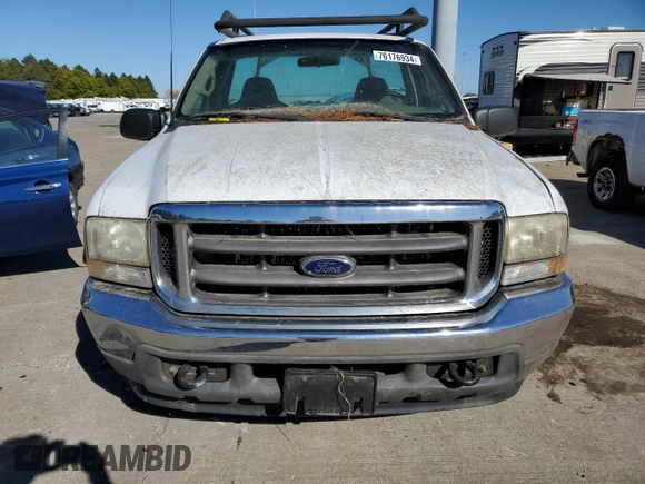 2002 Ford F-350 with VIN 1FTSF30S02EC49608, listed as a Copart auction lot 76176934 with 146,708 mi miles and Clean title. Bid and sale history available at DreamBid. Image 5.