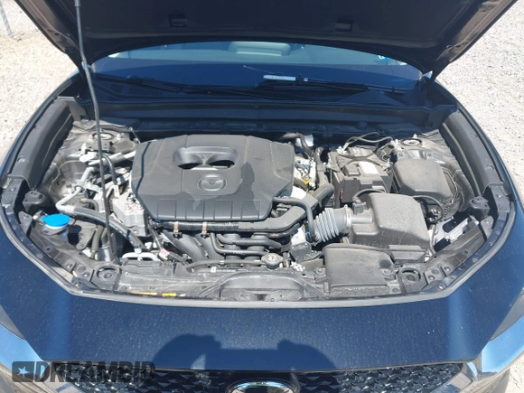 2023 Mazda CX-30 S Carbon Edition with VIN 3MVDMBCM1PM509987, listed as a IAAI auction lot 42060833 with 14,140 mi miles and . Bid and sale history available at DreamBid. Image 10.