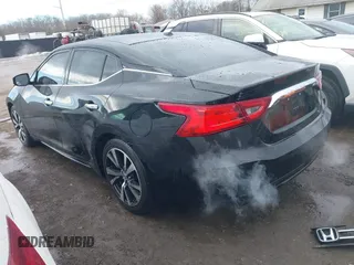 2016 Nissan Maxima Platinum with VIN 1N4AA6AP4GC414574, listed as a IAAI auction lot 41353383 with 153,387 mi miles and . Bid and sale history available at DreamBid. Image 3.
