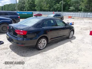 2015 Volkswagen Jetta SE with VIN 3VWD07AJ7FM313101, listed as a IAAI auction lot 42524898 with 207,725 mi miles and . Bid and sale history available at DreamBid. Image 4.