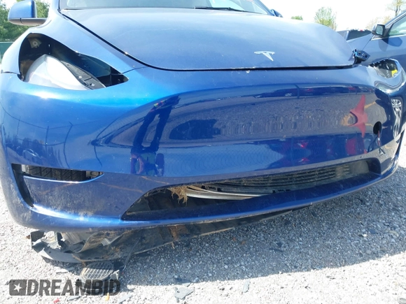 2023 Tesla Model Y Long Range with VIN 7SAYGDEE7PF702051, listed as a IAAI auction lot 42074182 with 50,473 mi miles and . Bid and sale history available at DreamBid. Image 18.