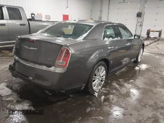 2014 Chrysler 300 C with VIN 2C3CCAKG8EH345577, listed as a IAAI auction lot 41719373 with 152,081 mi miles and . Bid and sale history available at carsss.com. Image 4.