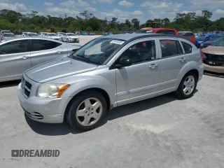 2009 Dodge Caliber SXT with VIN 1B3HB48A49D142621, listed as a Copart auction lot 55934095 with 158,885 mi miles and Non Repairable. Bid and sale history available at DreamBid. Image 1.