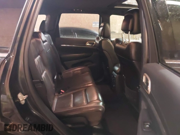 2015 Jeep Grand Cherokee Limited with VIN 1C4RJFBG8FC910133, listed as a IAAI auction lot 41289929 with 141,226 mi miles. Bid and sale history available at carsss.com. Image 8.