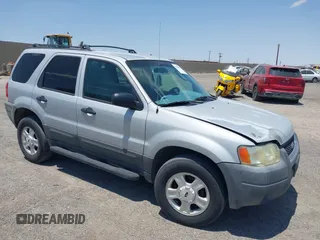 2003 Ford Escape XLT Popular 2 with VIN 1FMYU93103KC34143, listed as a IAAI auction lot 42744183 with 233,842 mi miles and . Bid and sale history available at DreamBid. Image 1.
