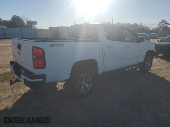 2015 Chevrolet Colorado 2WD Z71 with VIN 1GCGSCE3XF1139200, listed as a Copart auction lot 86397434 with 67,225 mi miles and Salvage title. Bid and sale history available at DreamBid. Image 3.