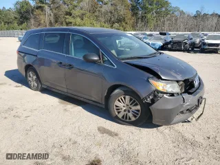 2015 Honda Odyssey LX with VIN 5FNRL5H29FB117569, listed as a Copart auction lot 87870755 with 147,295 mi miles and Salvage Title. Bid and sale history available at carsss.com. Image 4.