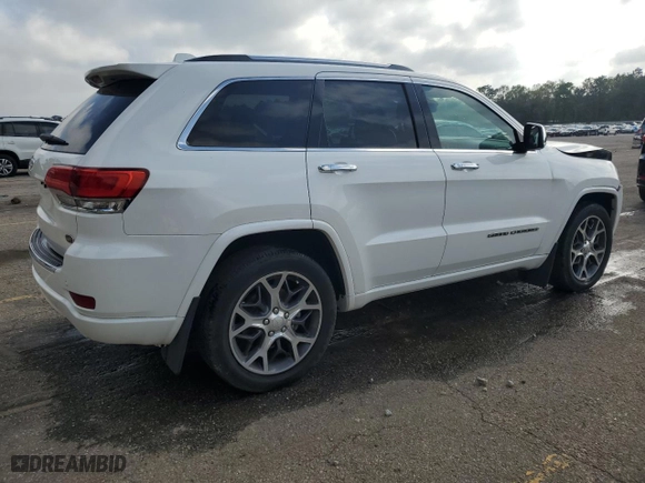 2019 Jeep Grand Cherokee Overland with VIN 1C4RJECG4KC833019, listed as a Copart auction lot 51277555 with 124,072 mi miles and Salvage Title. Bid and sale history available at carsss.com. Image 3.