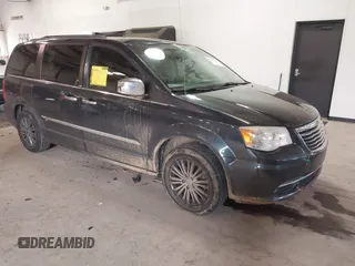 2014 Chrysler Town & Country Touring-L with VIN 2C4RC1CG1ER280151, listed as a IAAI auction lot 41413908 with 173,685 mi miles. Bid and sale history available at carsss.com. Image 1.