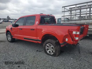 2023 Ford F-150 with VIN 1FTFW1P85PKD82406, listed as a Copart auction lot 84744944 with 32,982 mi miles and Salvage title. Bid and sale history available at DreamBid. Image 2.