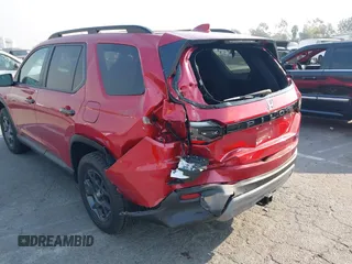 2023 Honda Pilot TrailSport with VIN 5FNYG1H65PB042687, listed as a IAAI auction lot 41259661 with 11,359 mi miles. Bid and sale history available at carsss.com. Image 6.