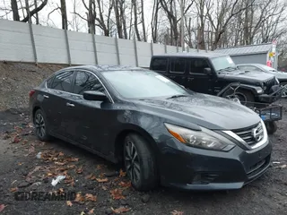 2018 Nissan Altima SV with VIN 1N4AL3AP3JC205875, listed as a IAAI auction lot 41892855 with 159,630 mi miles and . Bid and sale history available at carsss.com. Image 1.