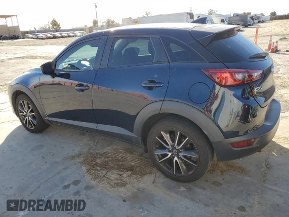 2017 Mazda CX-3 Touring z VIN JM1DKDC74H0165654, wystawiony jako Copart lot #41928295 z przebiegiem 173 567 mil mil oraz Szkoda całkowita • Salvage title. Historia ofert i sprzedaży dostępna na DreamBid. Obrazek 2.