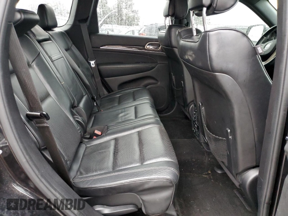 2015 Jeep Grand Cherokee Overland with VIN 1C4RJFCG7FC925995, listed as a Copart auction lot 85421214 with 142,266 mi miles and Salvage Title. Bid and sale history available at carsss.com. Image 11.