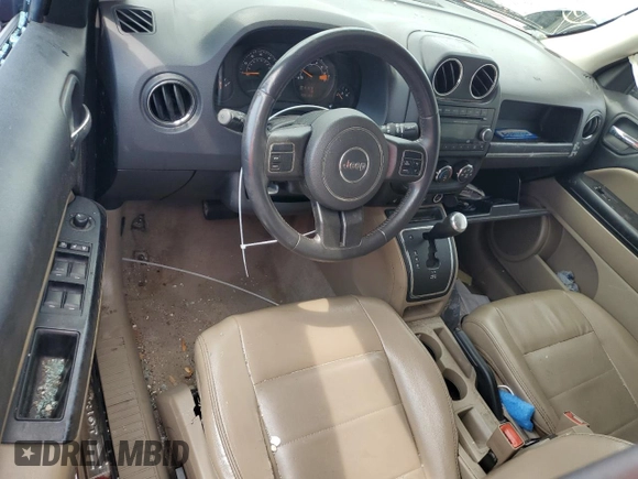 2014 Jeep Patriot High Altitude with VIN 1C4NJPFA0ED790184, listed as a Copart auction lot 49798305 with 196,188 mi miles and Salvage Title. Bid and sale history available at DreamBid. Image 8.
