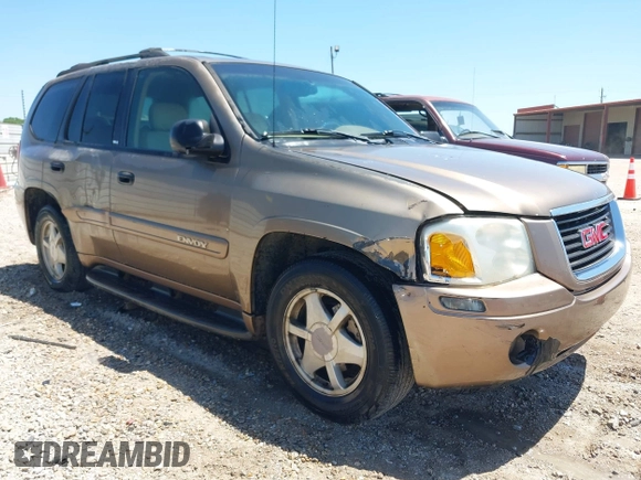 2003 GMC Envoy SLT with VIN 1GKDS13S432246741, listed as a IAAI auction lot 42051902 with 344,691 mi miles and . Bid and sale history available at DreamBid. Image 1.