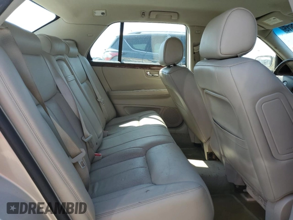 2007 Cadillac DTS Luxury I z VIN 1G6KD57Y37U110200, wystawiony jako Copart lot #52866815 z przebiegiem 157 393 mil mil oraz Szkoda całkowita • Salvage title. Historia ofert i sprzedaży dostępna na DreamBid. Obrazek 10.