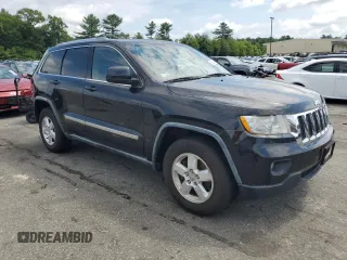 2011 Jeep Grand Cherokee Laredo with VIN 1J4RR4GG5BC572376, listed as a Copart auction lot 63388535 with 135,995 mi miles and Clean title. Bid and sale history available at DreamBid. Image 4.