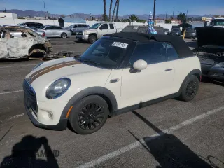 2016 MINI Convertible with VIN WMWWG5C53G3C19232, listed as a Copart auction lot 87704745 with 92,612 mi miles and Salvage Title. Bid and sale history available at DreamBid. Image 1.