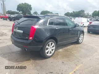 2015 Cadillac SRX Premium Collection with VIN 3GYFNGE30FS634363, listed as a IAAI auction lot 42672064 with 146,821 mi miles and . Bid and sale history available at DreamBid. Image 4.