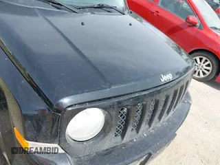 2014 Jeep Patriot Latitude z VIN 1C4NJRFB1ED761863, wystawiony jako IAAI lot #42524407 z przebiegiem 148 866 mil mil oraz . Historia ofert i sprzedaży dostępna na DreamBid. Obrazek 6.