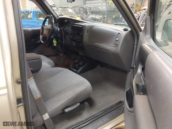 1999 Ford Ranger XLT with VIN 1FTYR11X0XTA72917, listed as a IAAI auction lot 41502156 with 106,585 mi miles. Bid and sale history available at carsss.com. Image 5.